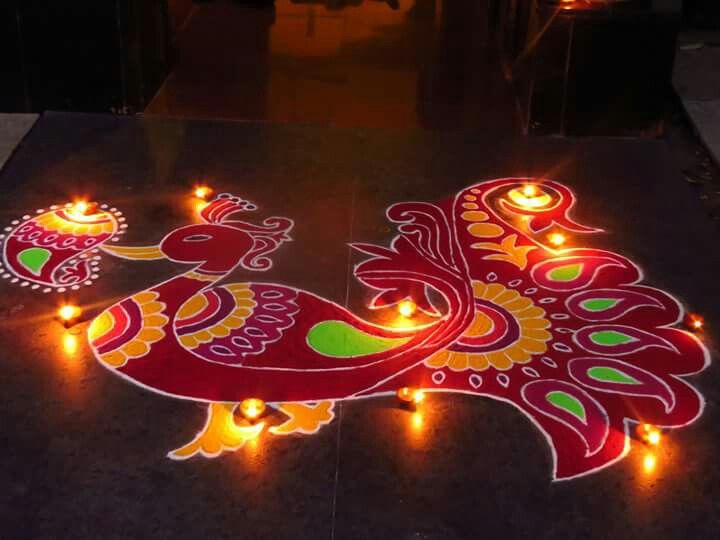 peacock diwali rangoli design by nupur saxena 7