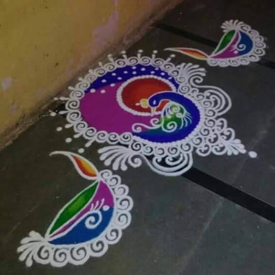 Peacock Rangoli Design by‪ Ashwini Tayade‬