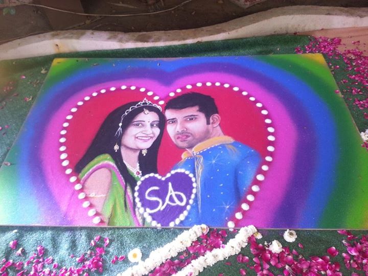 Wedding Portrait Rangoli by Aakruti