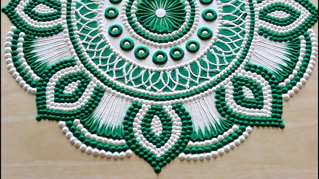 green floral rangoli design pooja
