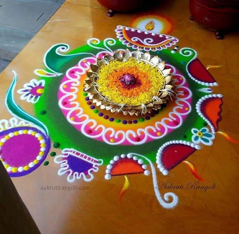 rangoli design diya by aakruti
