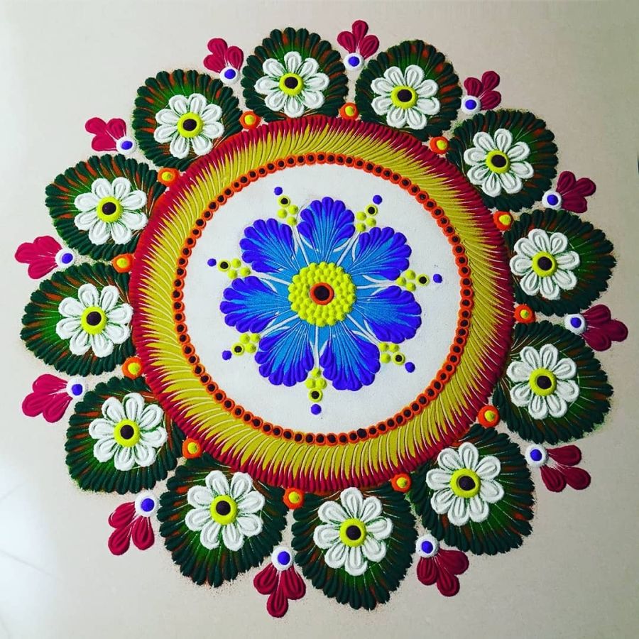 Simple flower rangoli design by simple rangoli | Image