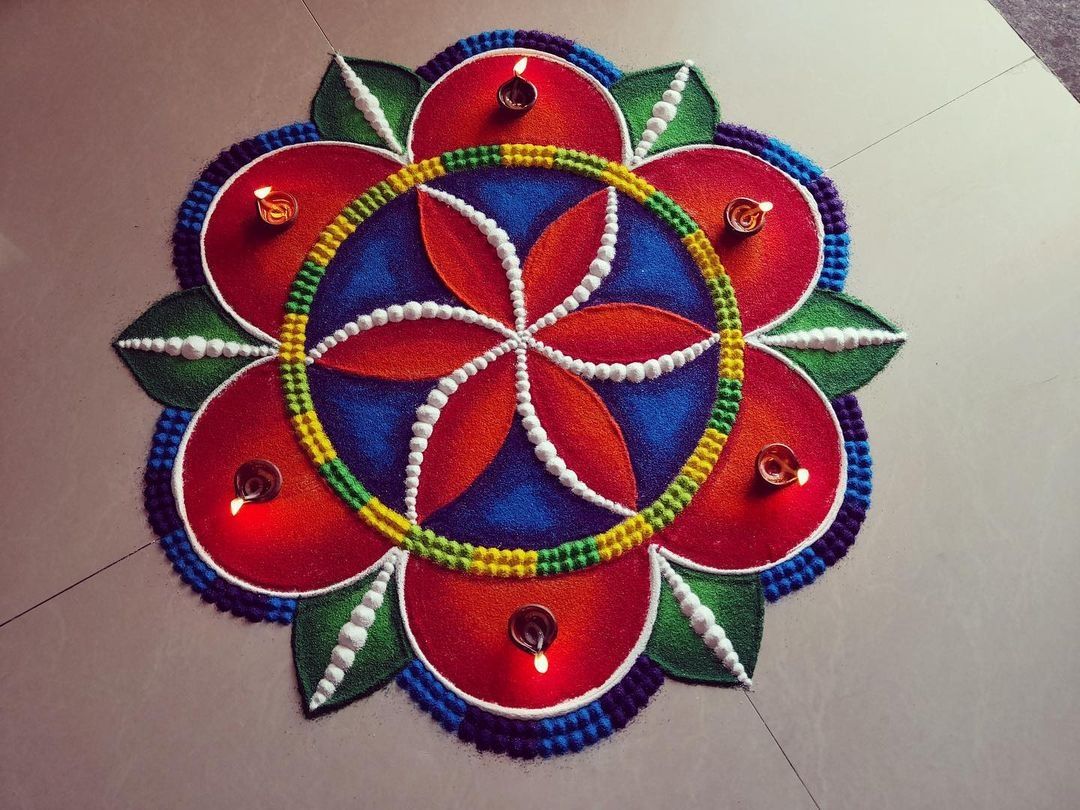 beautiful floral rangoli design by poonam patil
