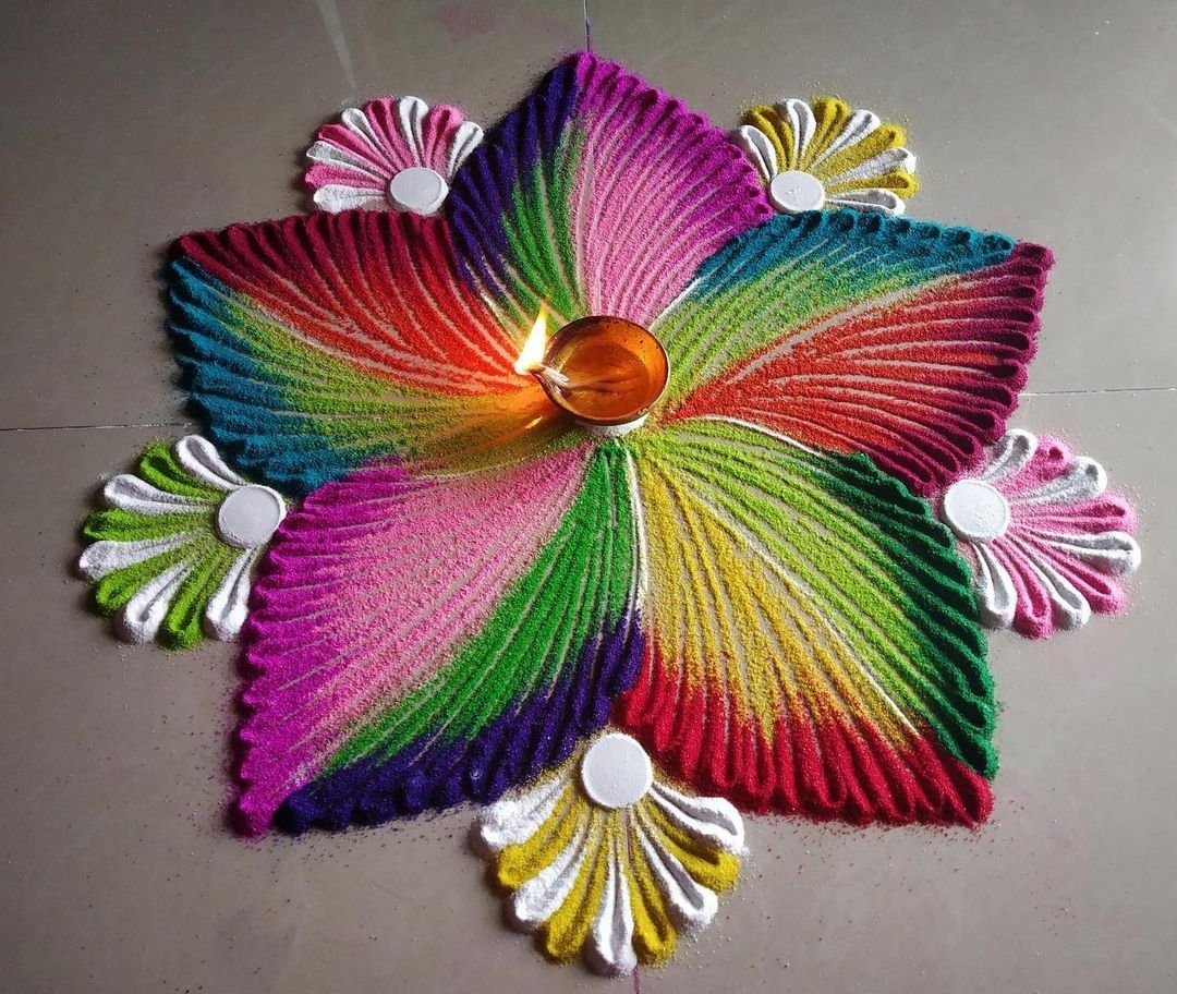 creative floral rangoli design by poonam patil