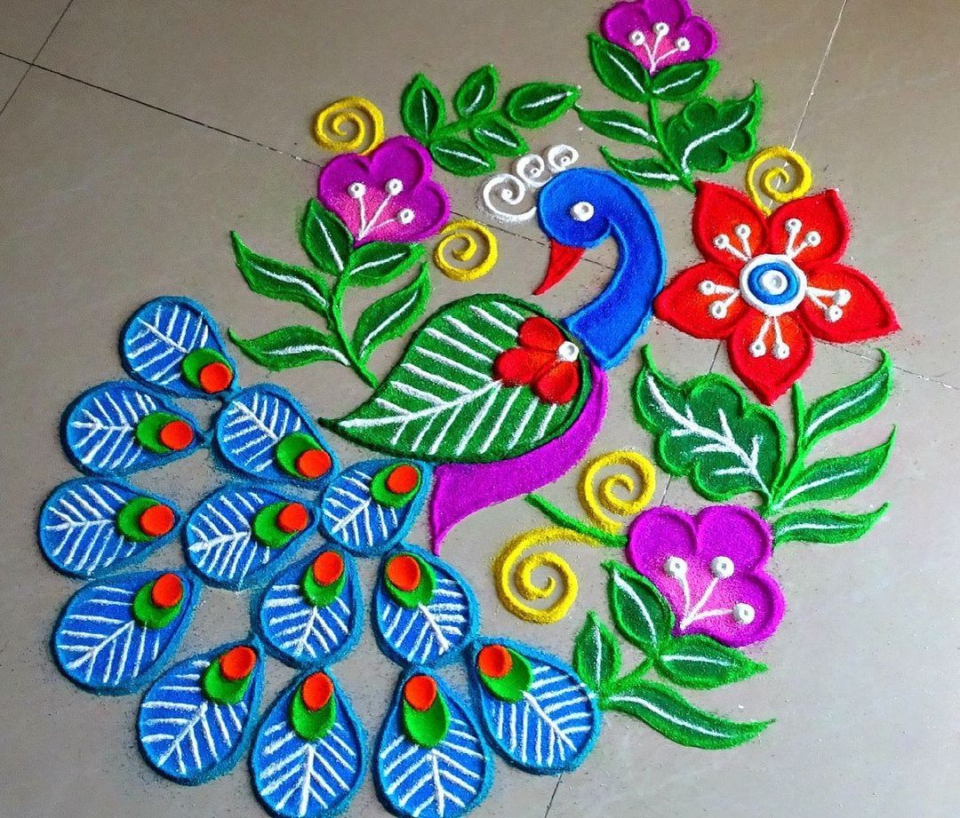 peacock rangoli design for festival occasion by poonam patil